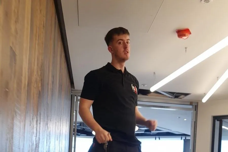 Faith Systems engineer installing fire alarm